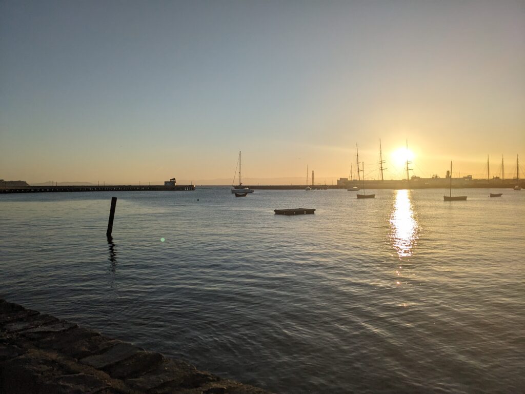 sunset over the emeryville marina from the shore